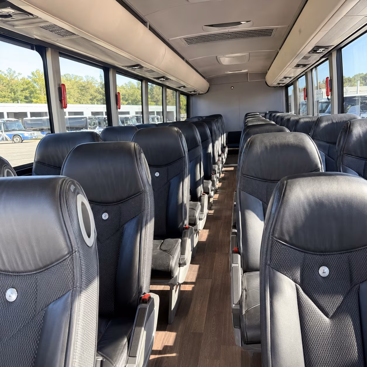 charter bus rentals from east lansing to detroit sports venues